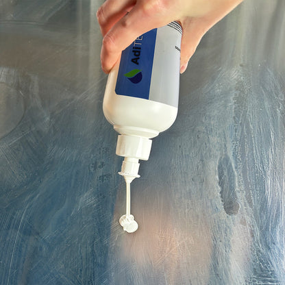 Abrillantador de Acero Inoxidable Profesional Aditek 0.5 Litro con boquilla